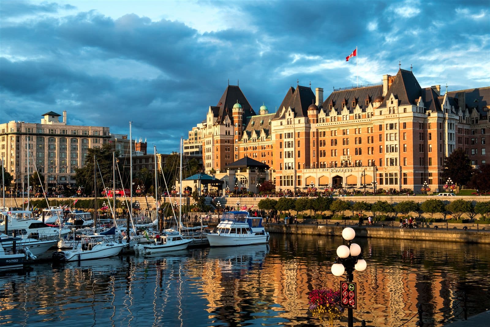 The Fairmont Empress hotel behind Victoria's Inner Harbour at dusk